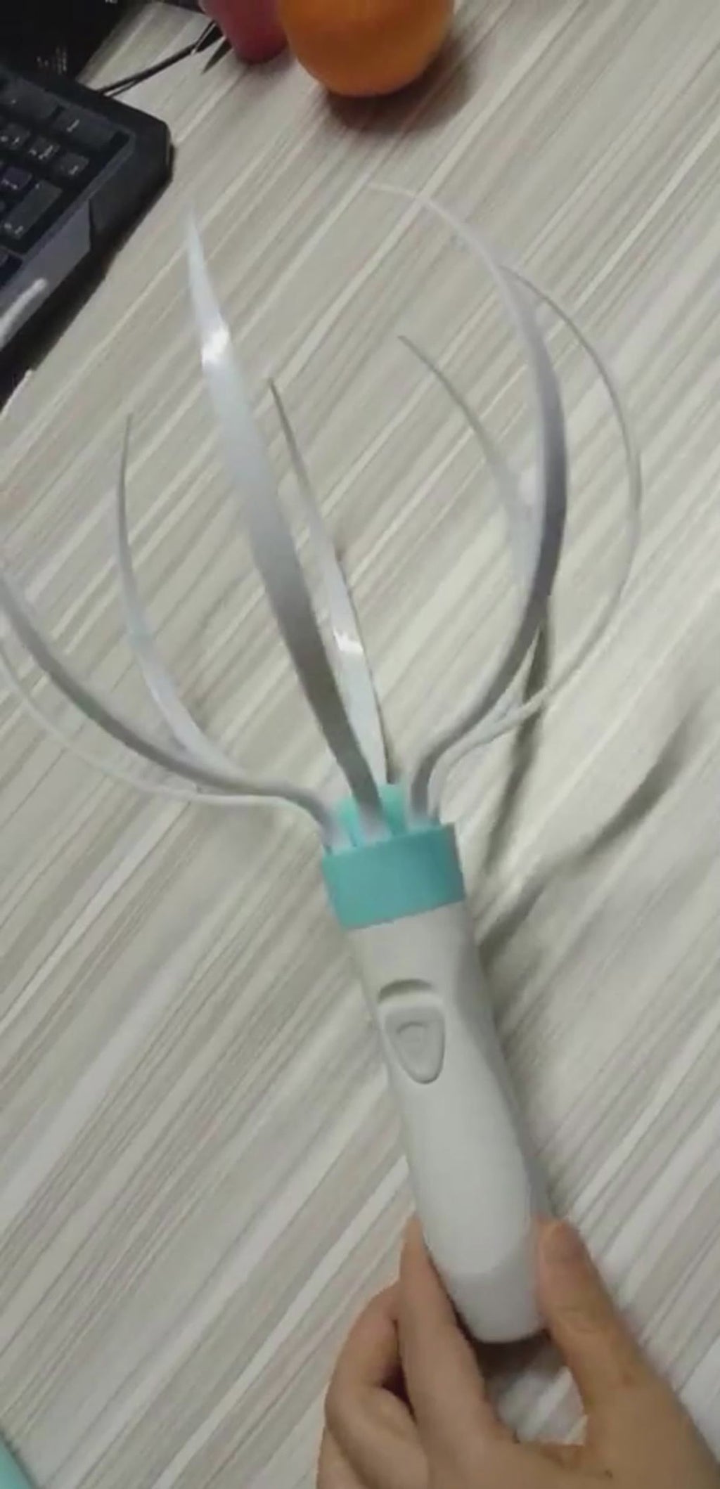 RESTORA Reset Massager — the 60-second nervous system off-switch